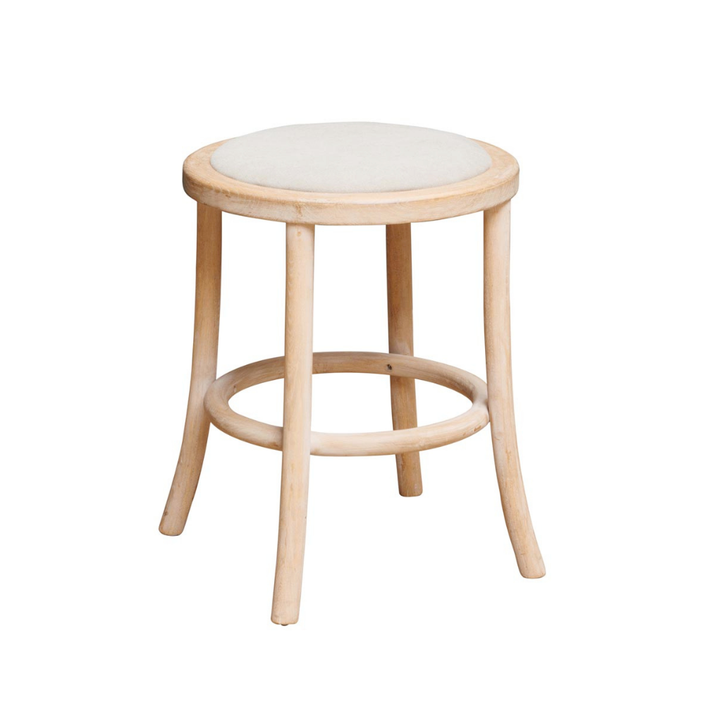 A light natural wood stool with a round off-white upholstered seat, photographed against a solid white background.