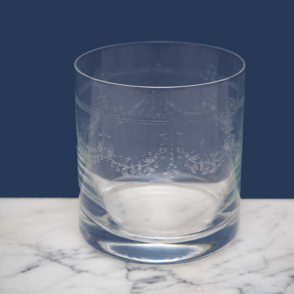 Clear glass tumbler with etched ornamental floral design band, drinking glassware beverage cup.
