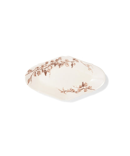 White ceramic oval-shaped plate with hand-painted brown grape vine botanical motif and fluted edges.