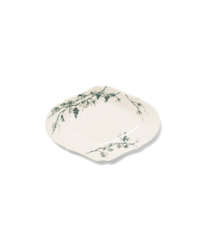 White ceramic oval-shaped plate with hand-painted green hop vine botanical motif.