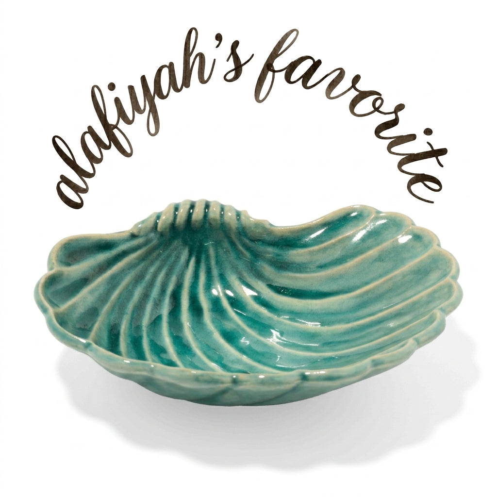 Marumitsu Nacre bowl turquoise
Pottery green W- 1.42 cm D- 1.18 cm H- 0.38 cm
