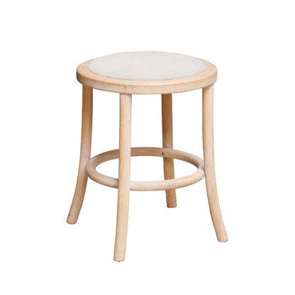 A light natural wood stool with a round off-white upholstered seat, photographed against a solid white background.