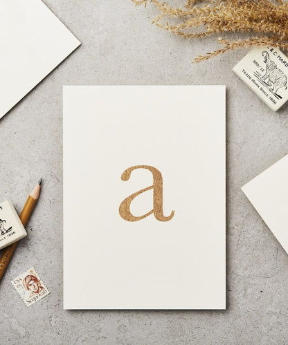 Lowercase Initial Postcard (A) - minimalist white notepad glittery gold